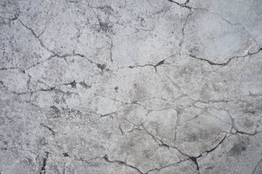 Arka planda eski çatlamış çimento dokusu