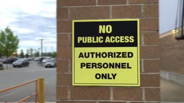 Motion Public Access Authorized Personnel Only Sign Wall Blurred Traffic — Stock Video