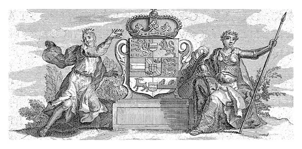 ヨハン ウィレム フリソの紋章と王冠 その周りにオブジェクトを持つ2つの寓意的な人物 台座の上のラテン文字の線 — ストック写真