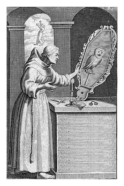 本书的第二页 作者是Jacob Lydius Romane Uilenspiegel 基座上有眼镜和十字架 还有一个烛台和一面大镜子 里面可以看见猫头鹰 — 图库照片