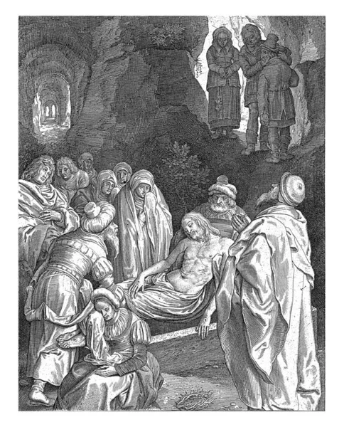 亚利马太和尼哥底母的约瑟 把基督的尸首放在坟墓里 马利亚 马利亚 和其他的人 都在哀哭 — 图库照片
