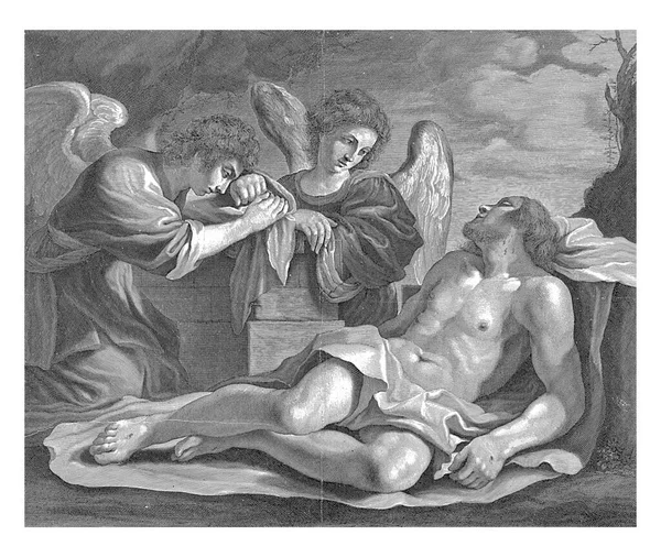 两个天使为基督的身体哀悼 它躺在一块布上 明显地可以看到红斑 — 图库照片