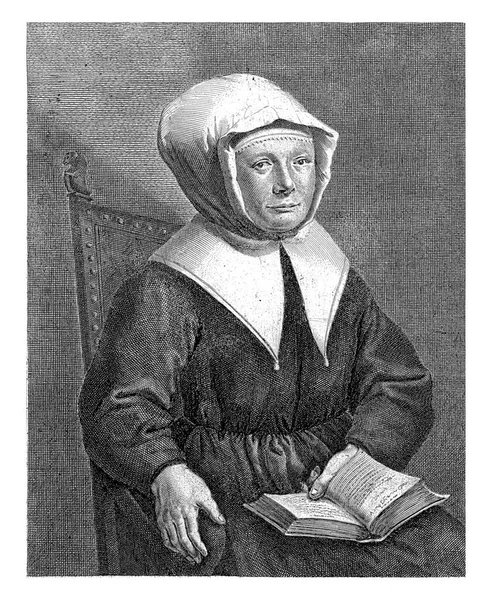 頭に白い帽子を被った女性の肖像画と膝の上の本 オランダ語で2行のキャプション付き — ストック写真