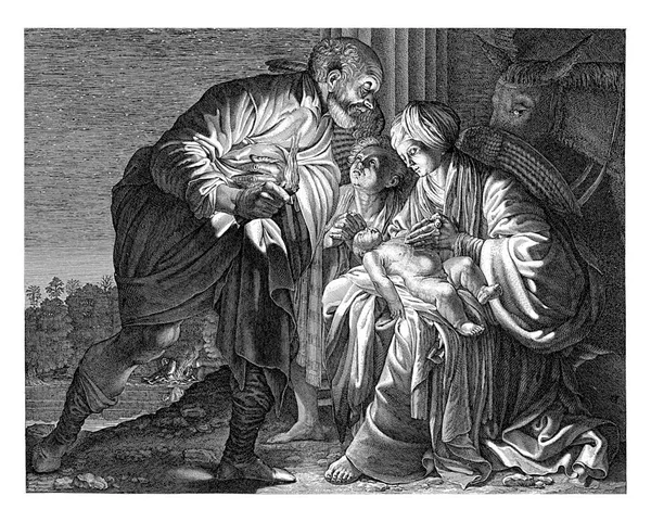 ヨセフはマリヤとキリストの子に屈し 手を打ちます かれらの後ろには 老練な天使がいて — ストック写真