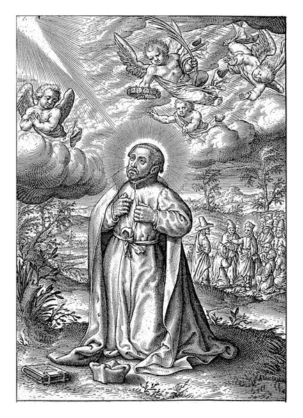 スペイン系イエズス会宣教師の聖フランシス ザビエルが草の上でひざまずいている 彼は雲の上の天使を尊敬している 天使たちは 天の王冠とナツメヤシの木をかれに — ストック写真