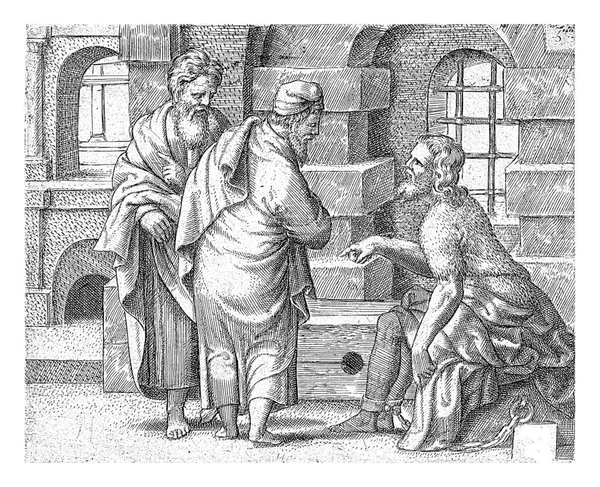 施洗者约翰被锁在监牢里 吩咐他的两个门徒问基督是否是他所期望的那个人 — 图库照片
