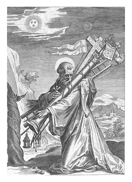 クラルヴォーの聖ベルナールは風景の中でひざまずいています 彼は左手に情熱の道具を持っている — ストック写真