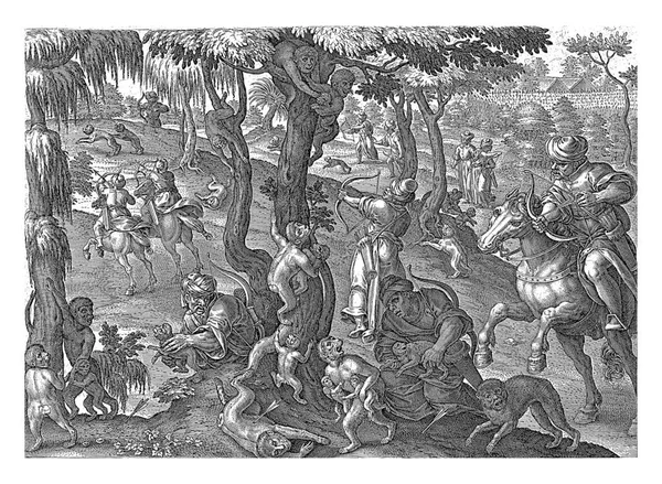 탄자들 사냥꾼 나무에 원숭이들에게 화살을 원숭이 어미는 마리와 — 스톡 사진