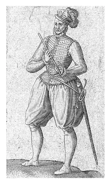 16世紀の服装における兵士の不満 左側のプロフィール 手に笛を持ち 脇に剣を持っている — ストック写真