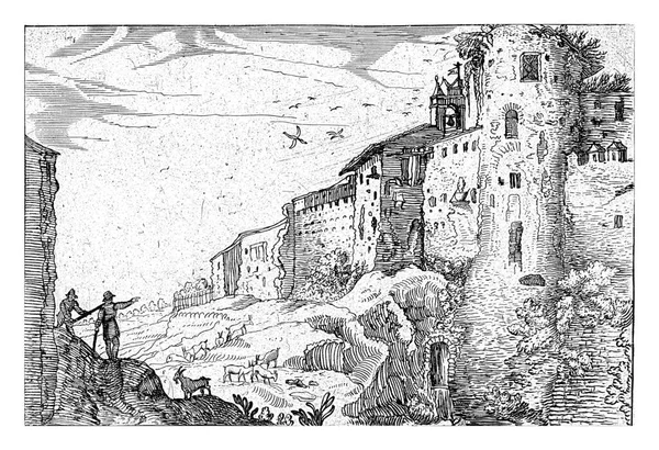 風景の中に 右側の丘の上に ローマの遺跡の横にあります 左側には壁があり 2人の羊飼いとヤギがいて — ストック写真