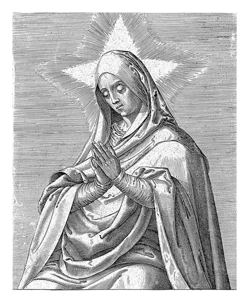 Mary dua etmek için ellerini katladı. Kenarında Latince iki satırlık bir başlık.