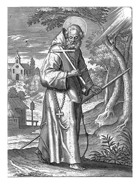 stock image Saint Francis of Paola, Adriaen Collaert, 1608 Saint Francis of Paola. He wears a monk's habit and holds a cross in his hand. In the background a monastery of the order of the Minims founded by him.