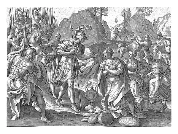 아비가일이 다윗에게 용서를 구하자 1585년 앞에서 아비가일의 무릎을 그에게 음식을 스톡 사진