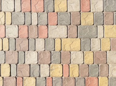 Kaldırımdaki fayanslar. Döşeme kaplamalarının kapanışı. Sokak kaldırım levhaları. Yolun çimento bloğu. Beton tuğla kare taş zemin.