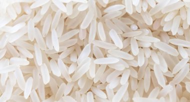 Beyaz pirinç dokusu arka planı. Beyaz pirinç arka planı yığını. makro çekim pirinç dokusu deseni