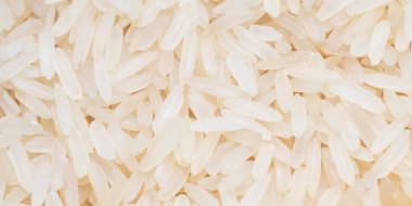 Beyaz pirinç dokusu arka planı. Beyaz pirinç arka planı yığını. makro çekim pirinç dokusu deseni