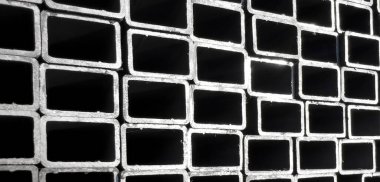 Metal profile manufacturing. Structural metal shapes.Metal profiles texture. Metal constructions factory. 