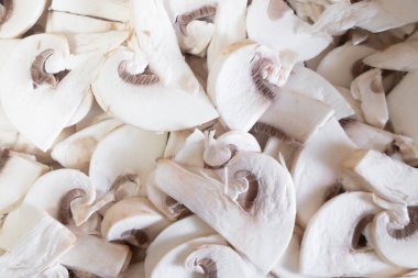 Dilimlenmiş şampiyon mantar dokusu. Mantar arka planı. Taze Porcini Şampiyonu mantarları kapayın..