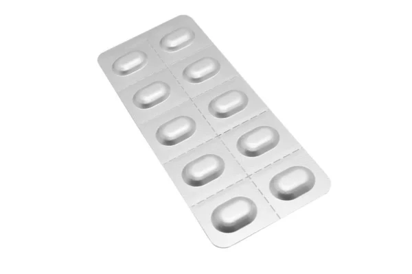 白い背景に隔離された銀製ブリスター包装に錠剤のマクロショット杭 アルミ箔ブリスターパック 医薬品 薬や薬が閉まります 丸薬の背景 — ストック写真