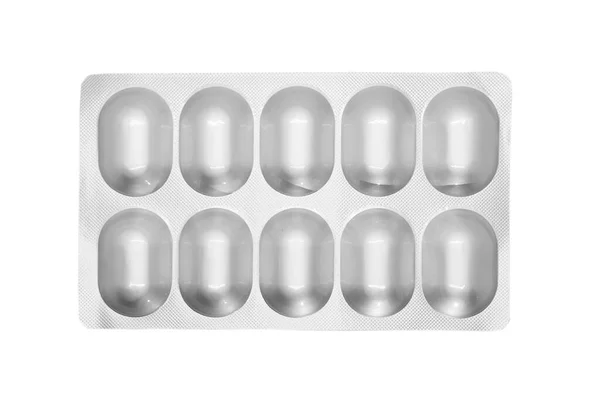 在白色背景下隔离的银白色起泡包装中 宏观弹丸堆放在一起 铝箔水泡包 药学产品 药丸和药物关闭 药丸背景 — 图库照片