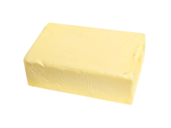 白い背景に隔離された天然バターのブロック バターレンガ分離 ストック画像