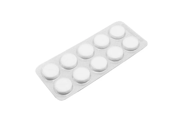 在白色背景下隔离的银白色起泡包装中 宏观弹丸堆放在一起 铝箔水泡包 药学产品 药丸和药物关闭 药丸背景 — 图库照片