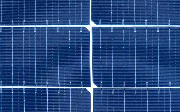 stock image Macro shot blue Solar panel background texture. Solar panels pattern for sustainable energy. Renewable solar energy. Alternative energy.