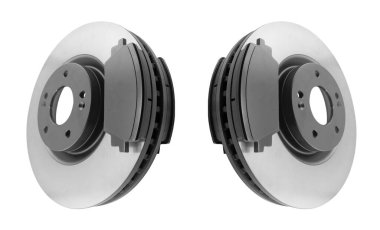 Fren diskleri ve fren yastıkları beyaz arka planda izole edilmiş. Otomobil parçaları. Fren diski pervanesi beyaza izole edildi. Fren diski. Araba parçası. Araba servisi veya bakım için yedek parça