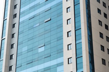 Finans bölgesindeki modern ofis binaları. Ofis binaları. Cam bina arka planı. Gökdelen 'in Pencereleri. İş Ofisi. Kurumsal yapı