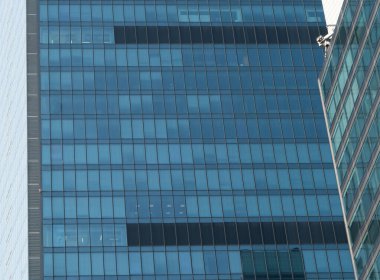 Finans bölgesindeki modern ofis binaları. Ofis binaları. Cam bina arka planı. Gökdelen 'in Pencereleri. İş Ofisi. Kurumsal yapı