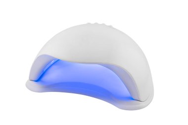 Beyaz arka planda izole edilmiş çiviler için UV LED lamba. Manikür için ultraviyole lamba. Jel cilası. Jel cilası ekipmanı