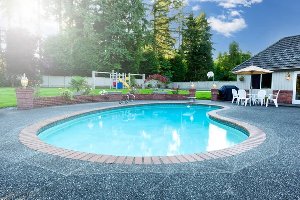 Heart Shaped Home Swimming Pool Large Backyard Late Daylight Stock Photo