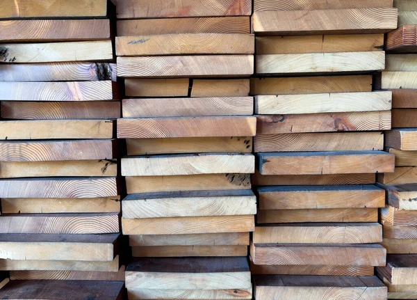 Various types of stacked wood board background