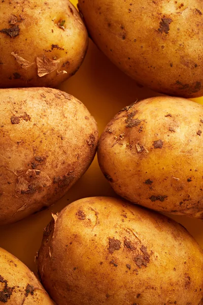 Potatoes Yellow Background — Stock Photo, Image