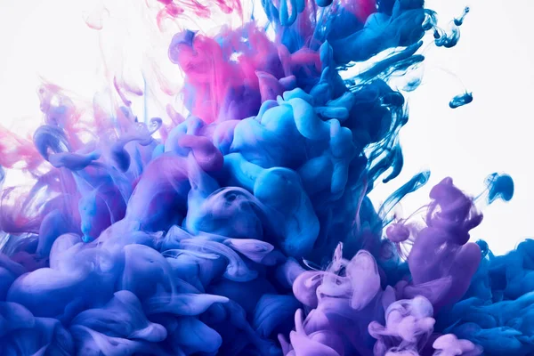 流动的蓝色和粉色混合油漆抽象背景 — 图库照片