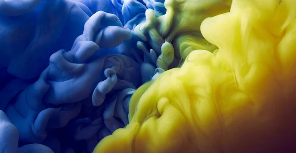 蓝色和黄色油漆背景的水花 — 图库照片
