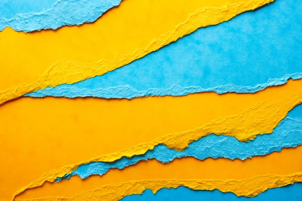 Aufgerissene Papierblätter Hintergrund Blauen Und Gelben Farben — Stockfoto