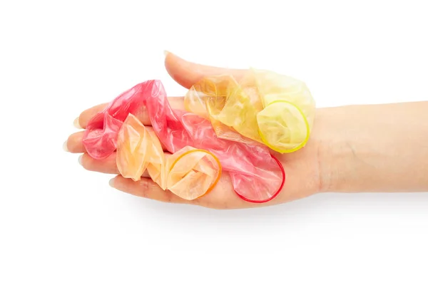 Frauenhand Hält Gebrauchte Kondome Der Handfläche Isoliert Auf Weißem Hintergrund — Stockfoto