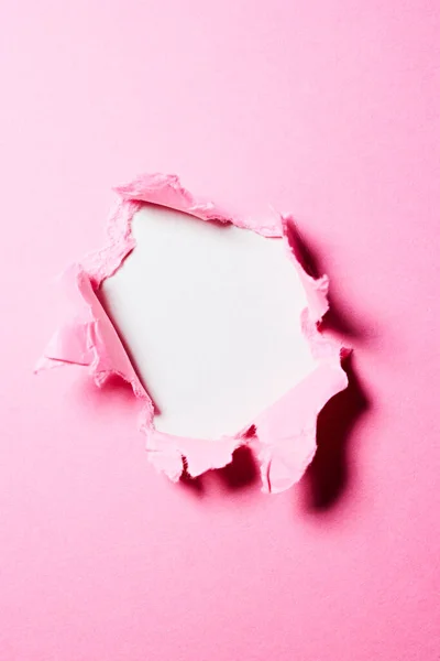 Rózsaszín Papír Háttér Lyukkal Közepén — Stock Fotó
