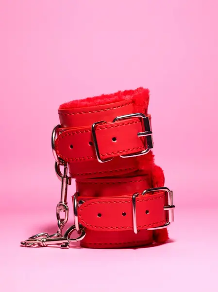 Red Pair Handcuffs Sex Games Pink Backdrop — Stock Photo, Image