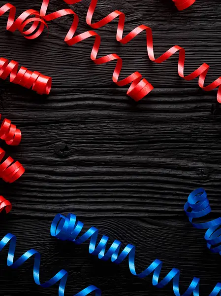 Red Blue Ribbon Celebration Black Wooden Background — Stock Photo, Image