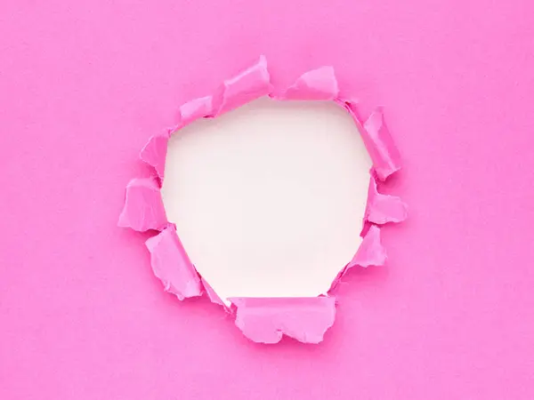 Rózsaszín Papír Tépett Lyukkal Közepén — Stock Fotó