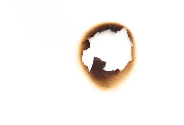 Loch Verbrannten Papier Isoliert Auf Weißem Hintergrund Stockfoto