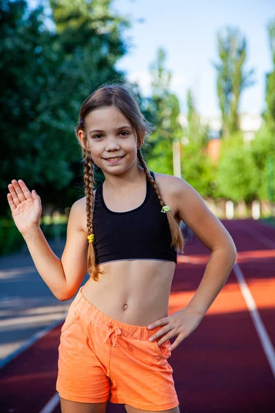 Teenage Girl Athlete Stadium Training Doing Physical Exercises Summer Stock Picture