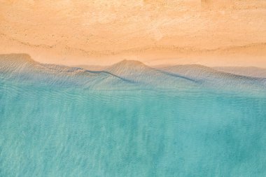 Looking at shore with clear sand and transparent turquoise sea water