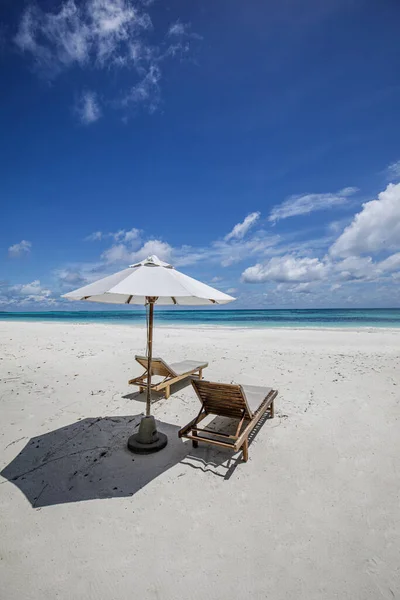 stock image beach chairs and sun umbrella near sea 