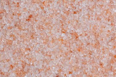 Himalaya pembe tuz dokusu. Doğal gıdaların pembe kristalleri Himalaya kaba tuz dokusu veya arka planı, yakın plan, yüksek çözünürlüklü..