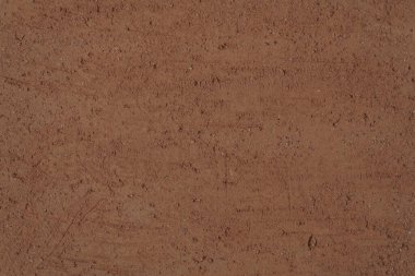 Terracotta dokusu. Yanmamış kil, arkaplan, yakın plan, yüksek çözünürlüklü çizik yüzeyi ile pürüzlü.