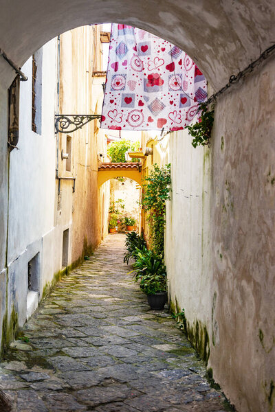 Sessa Aurunca, Italy. A small street among the old houses of a medieval village in the province of Caserta. Italy