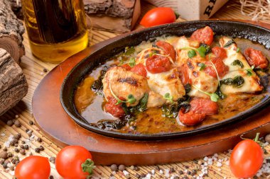 fırında tavuk ve vişneli domates.